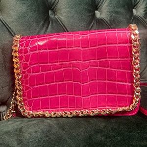 Pink Crocodile style purse.